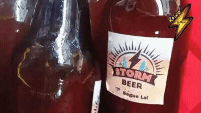 A Bottle Of Storm Beer Has A Lightning Bolt On It GIF