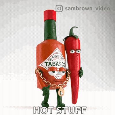 A Bottle Of Tabasco Is Chained To A Pepper GIF