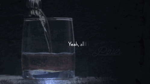 A Bottle Of Water Is Poured Into A Glass With The Words " Yeah All I Know To Do Is Pour " GIF