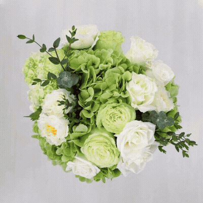 A Bouquet Of Colorful Flowers Including Roses And Chrysanthemums GIF
