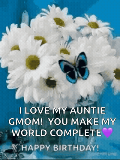 A Bouquet Of Daisies In A Vase With A Butterfly On It GIF