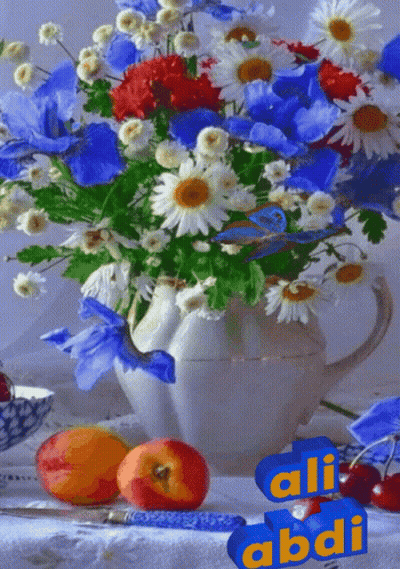 A Bouquet Of Flowers Sits On A Table Next To Apples And Cherries With The Name Ali Abdi Written On The Bottom GIF