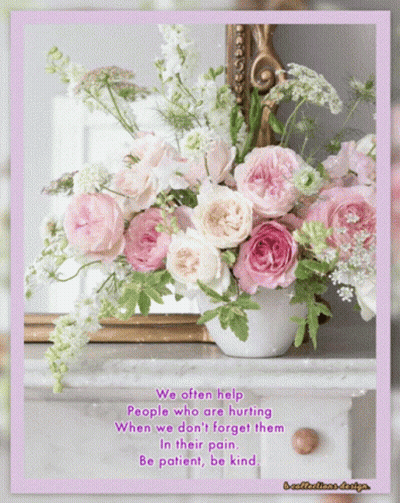 A Bouquet Of Pink And White Flowers In A Vase With A Quote GIF
