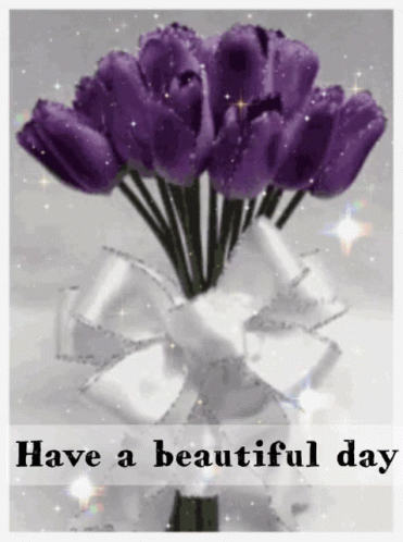 A Bouquet Of Purple Flowers In A Vase With The Words Have A Beautiful Day On The Bottom GIF