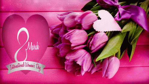 A Bouquet Of Purple Tulips Sits In Front Of A Pink Heart That Says 8 March International Women 'S Day GIF