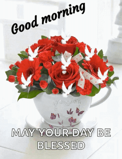 A Bouquet Of Red Roses In A White Cup With The Words " May Your Day Be Blessed " GIF