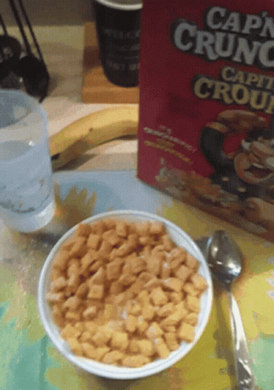 A Bowl Of Capn Crunch Next To A Box GIF