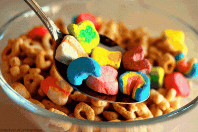 A Bowl Of Cereal With Lucky Charms And Marshmallows GIF