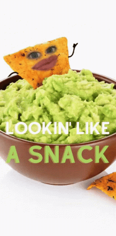A Bowl Of Guacamole With A Tortilla Chip That Looks Like A Face GIF
