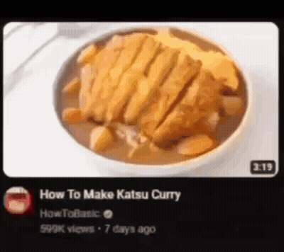 A Bowl Of Katsu Curry With Meat And Vegetables Is Being Shown On A Tv Screen . GIF