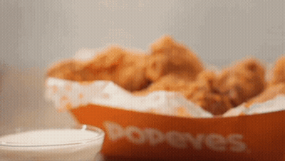 A Bowl Of Popeye 'S Fried Chicken And A Bowl Of Dipping Sauce GIF