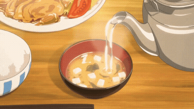 A Bowl Of Soup Next To A Bowl Of Rice GIF