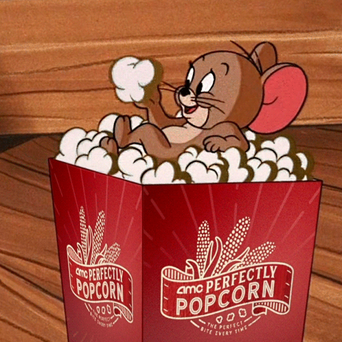 A Box Of Amc Perfectly Popcorn Contains A Cartoon Character GIF