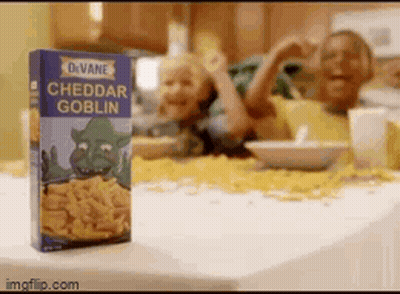A Box Of Cheddar Goblin Sits On A Table GIF