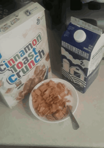 A Box Of Cinnamon Toast Crunch Next To A Bowl Of Cereal And A Carton Of Milk GIF
