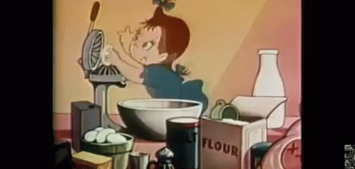 A Box Of Flour Sits On A Table Next To A Girl GIF