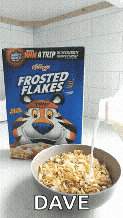 A Box Of Frosted Flakes Cereal Next To A Bowl GIF