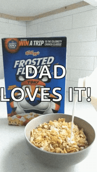 A Box Of Frosted Flakes Cereal With A Bowl Of Cereal Next To It GIF