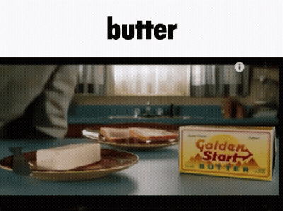A Box Of Golden Start Butter Sits Next To A Slice Of Bread On A Plate GIF