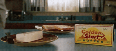 A Box Of Golden Start Butter Sits On A Table GIF