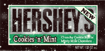 A Box Of Hershey 'S Cookies ' N ' Mint Crunchy Cookie Bits In Minty Milk Chocolate GIF