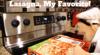 A Box Of Lasagna Sits On A Stove Next To A Puppet GIF
