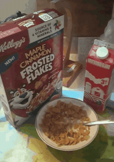 A Box Of Maple Cinnamon Frosted Flakes Sits Next To A Bowl Of Cereal GIF