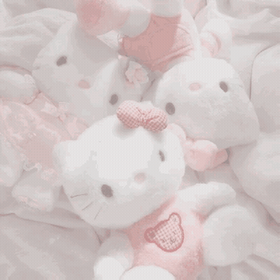 A Box Of Pink Cakes With Strawberries On Top GIF