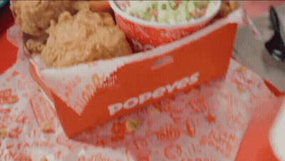 A Box Of Popeye 'S Fried Chicken And Coleslaw GIF