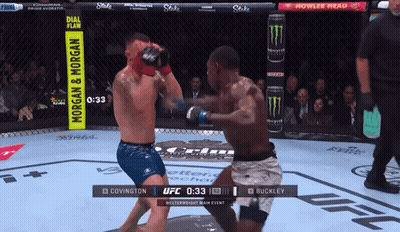 A Boxing Match Between Morgan And Buckley Is Being Broadcast On Ufc GIF