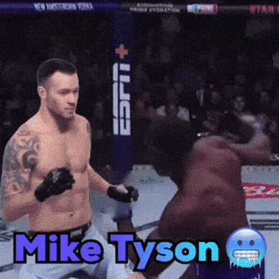 A Boxing Match With The Name Mike Tyson On The Screen GIF