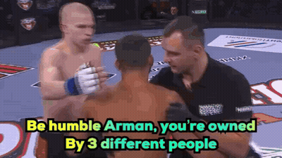 A Boxing Match With The Words " Be Humble Arman You 'Re Owned By 3 Different People " At The Bottom GIF