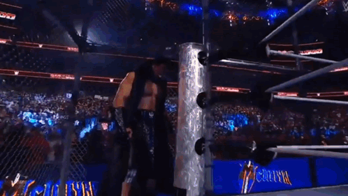 A Boxing Ring With A Sign That Says Otvk On It GIF