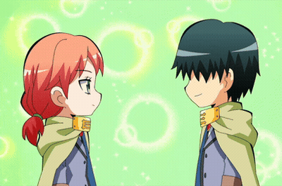 A Boy And A Girl Are Holding Hands And The Girl Has Red Hair GIF