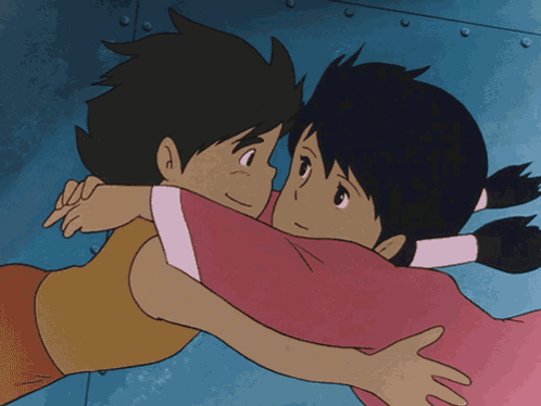 Boy And Girl Hugging In Cartoon GIF