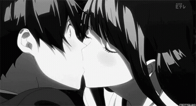 A Boy And A Girl Are Kissing In A Black And White Anime . GIF
