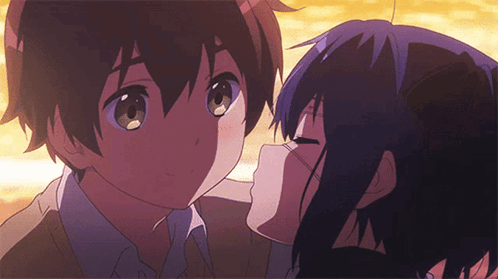 A Boy And A Girl Are Kissing In A Cartoon GIF