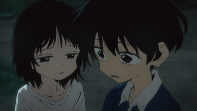 A Boy And A Girl Are Looking At Each Other GIF