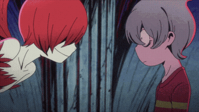 A Boy And A Girl Are Looking At Each Other GIF