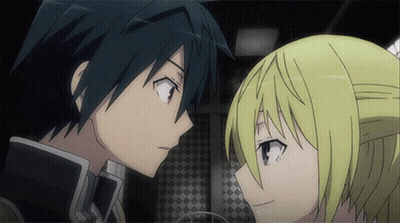 A Boy And A Girl Are Looking At Each Other In A Dark Room GIF