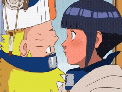 A Boy And A Girl Are Looking At Each Other GIF