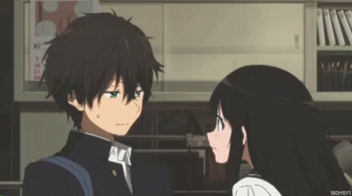 A Boy And A Girl Are Looking At Each Other With A Calendar Behind Them That Says 10 GIF