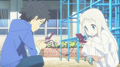 A Boy And A Girl Are Playing With A Video Game GIF