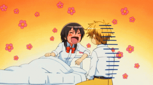 A Boy And A Girl Are Sitting Next To Each Other And The Girl Is Laughing GIF