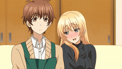 A Boy And A Girl Are Sitting On A Couch Together GIF