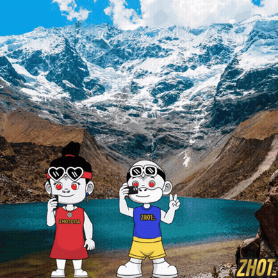 A Boy And A Girl Are Standing In Front Of A Snowy Mountain With The Word Zhot On The Bottom GIF