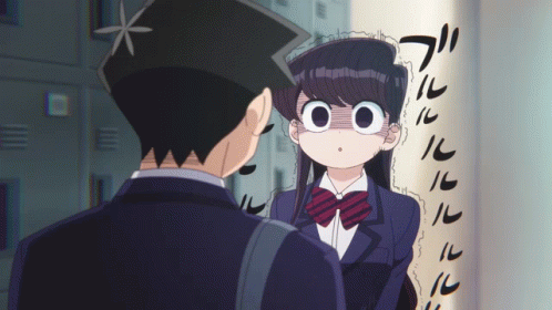 A Boy And A Girl Are Standing Next To Each Other And The Girl Has A Shocked Look On Her Face GIF