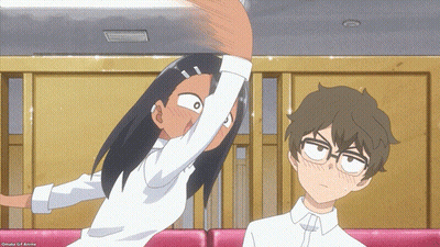 A Boy And A Girl Are Standing Next To Each Other And The Girl Has Her Arm Up GIF