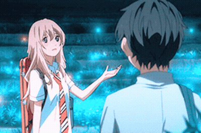 A Boy And A Girl Are Standing Next To Each Other And The Girl Is Holding Out Her Hand GIF