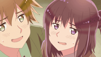 A Boy And A Girl Are Standing Next To Each Other GIF